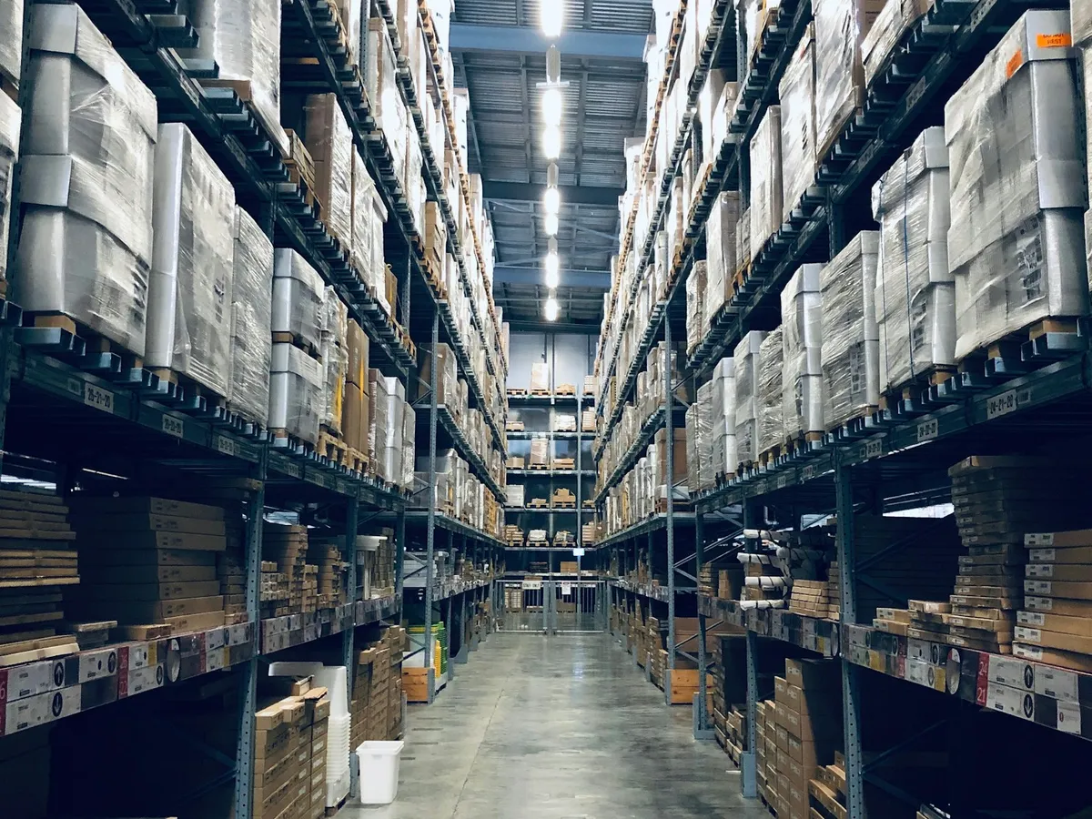 Racked storage aisles inside a warehouse